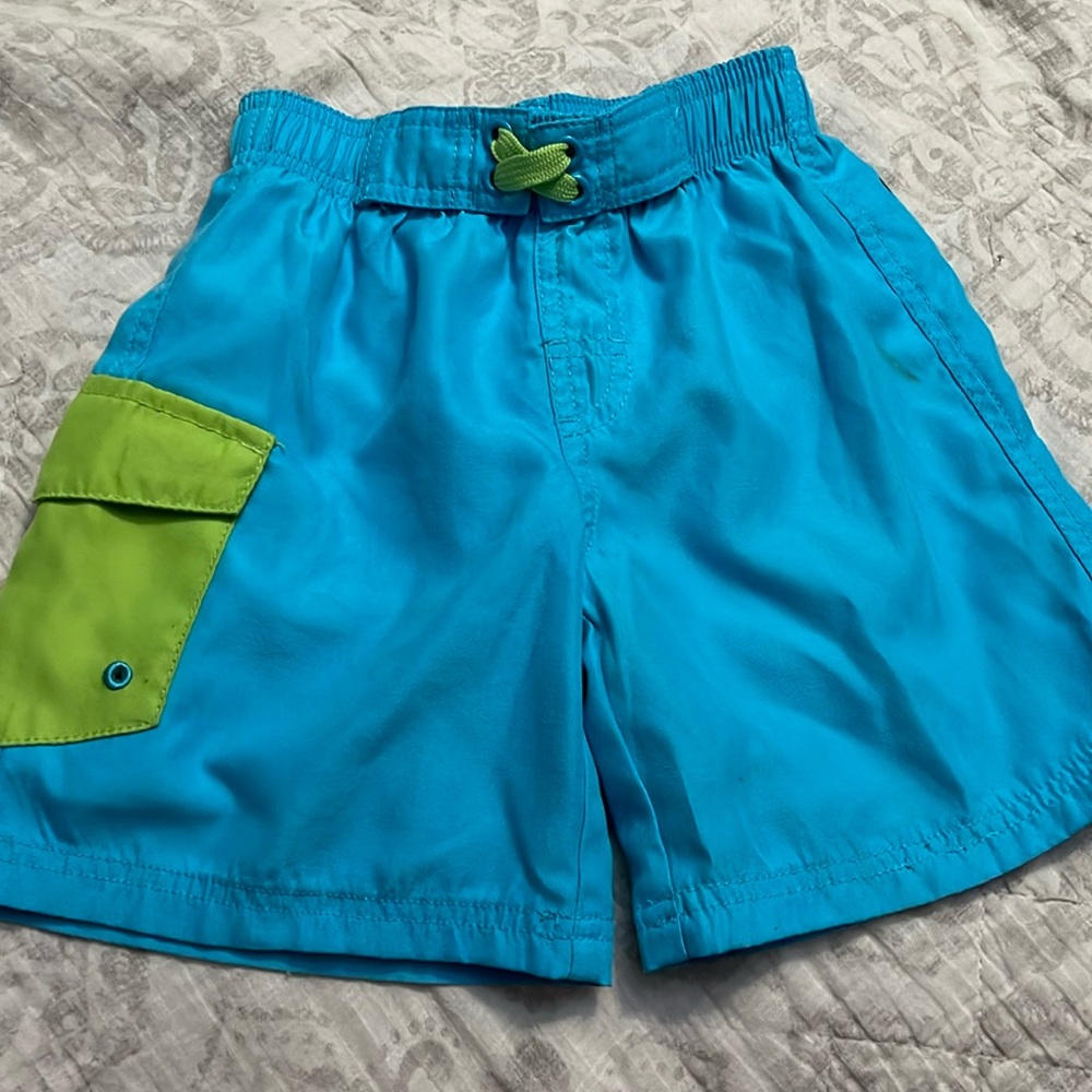 Boy’s turquoise blue swim shorts